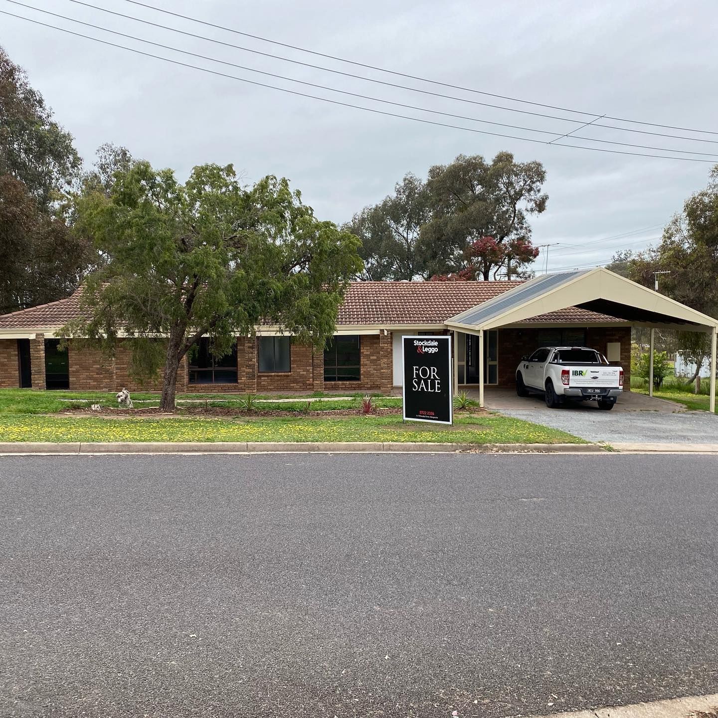 Brick house with carport, 