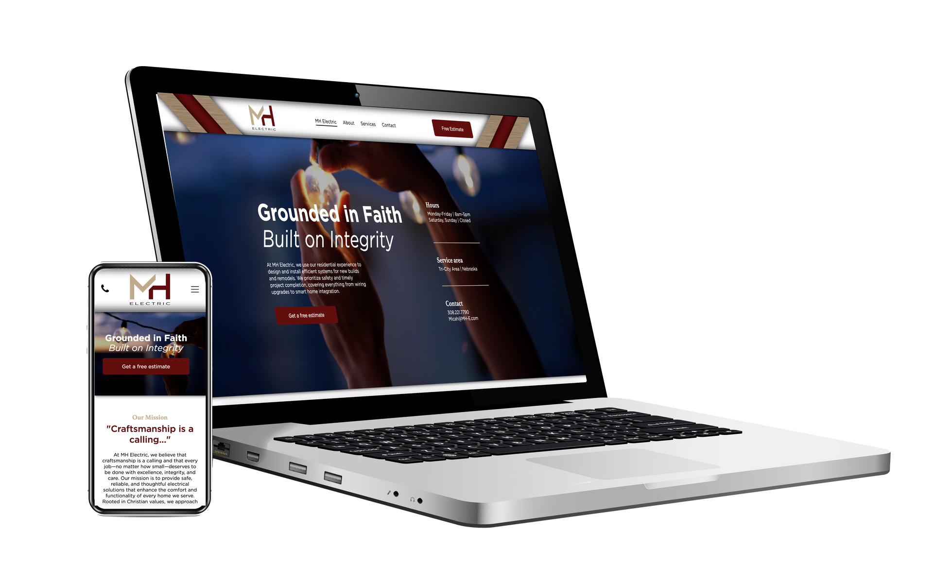 A laptop and a cell phone are sitting next to each other on a white background.