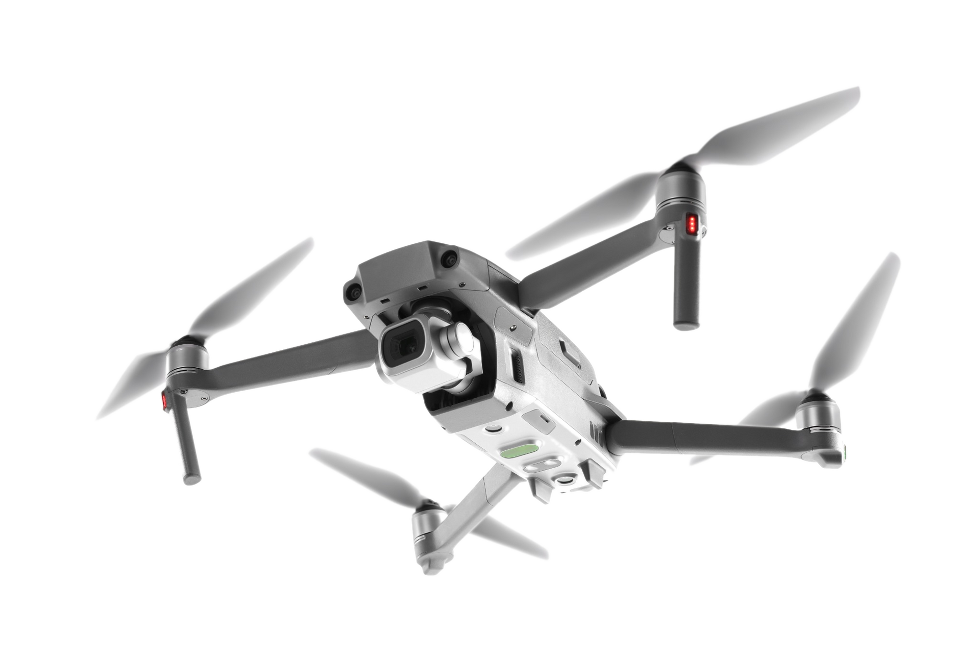 Lit incandescent light bulb with amber-tinted glass and metallic base.