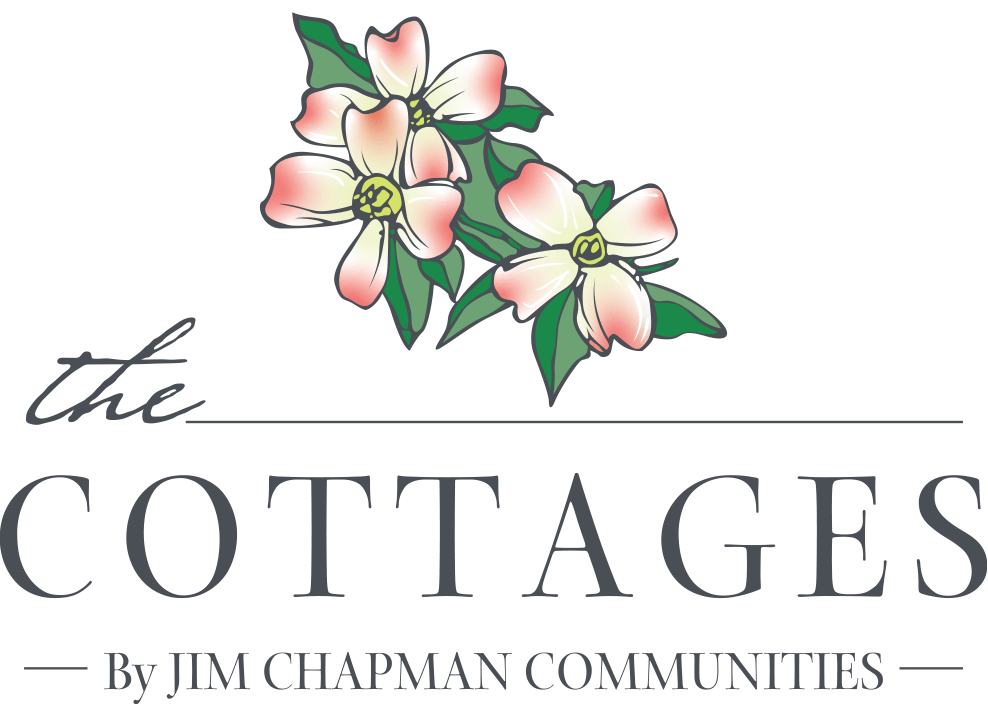 The Cottages logo with pink flowers and the text &ldquo;By Jim Chapman Communities&rdquo;