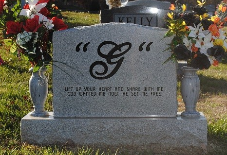 upright memorial with vases