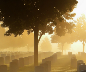 sunset over cemetery