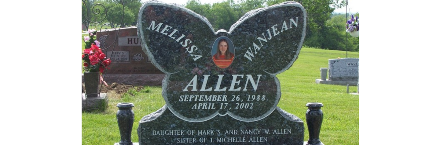 butterfly headstone with vases