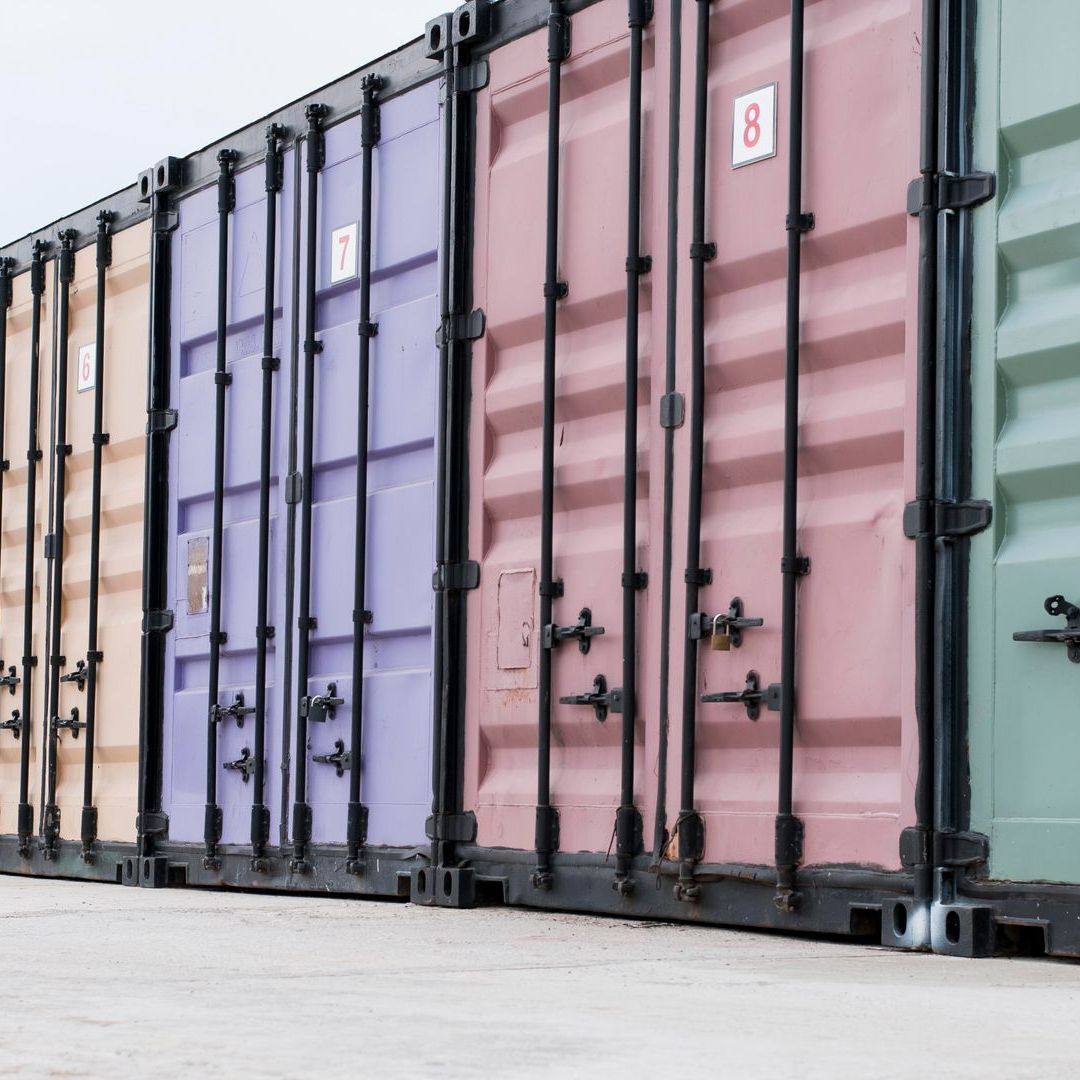 A Row of Shipping Containers of Different Colors