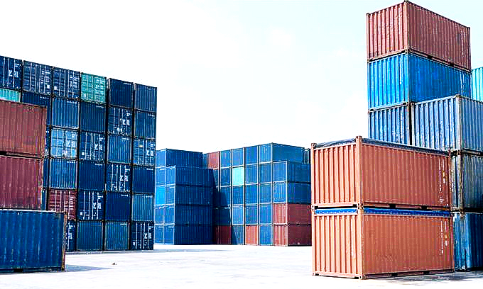 Shipping Cotainers stacked at a depot 