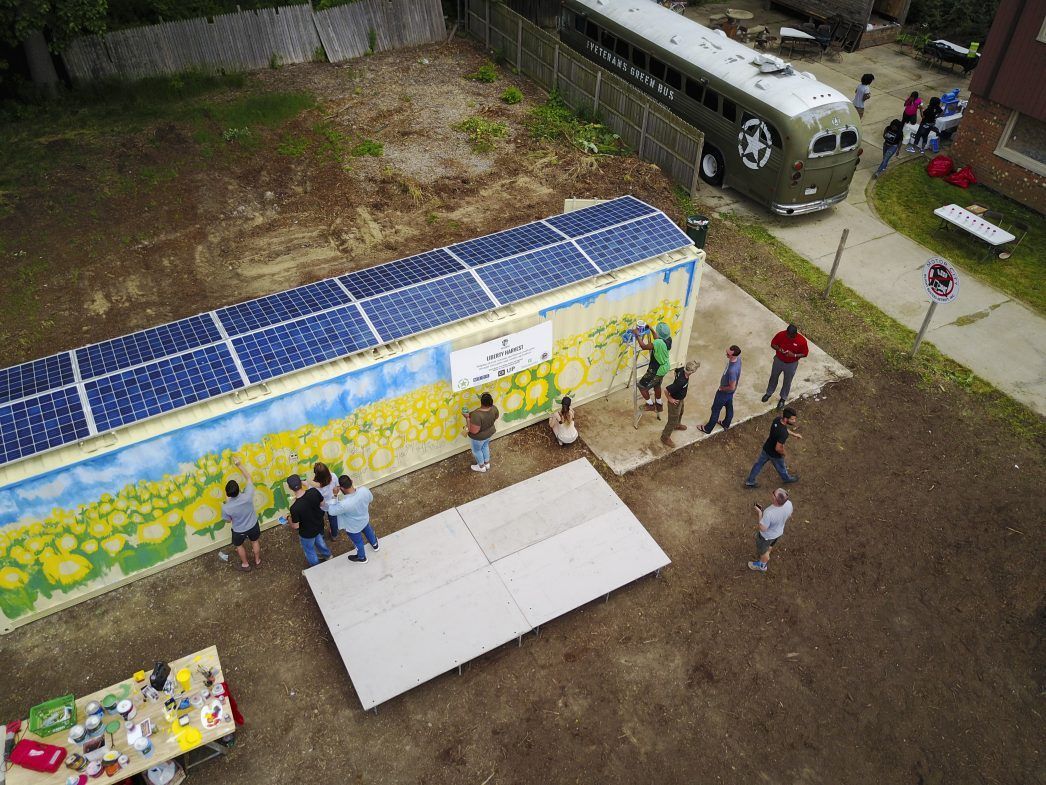 Sipping Container converted to a solar-powered greenhouse and aquaponics system