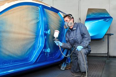 Worker Doing Auto Body Paint — Hazlehurst, MS — Beall’s Body Shop