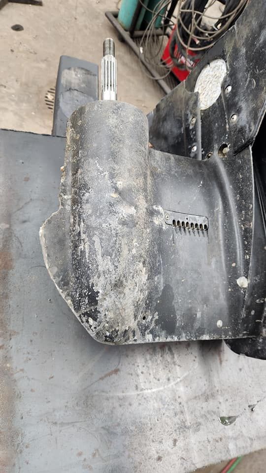 A piece of metal is sitting on top of a table.