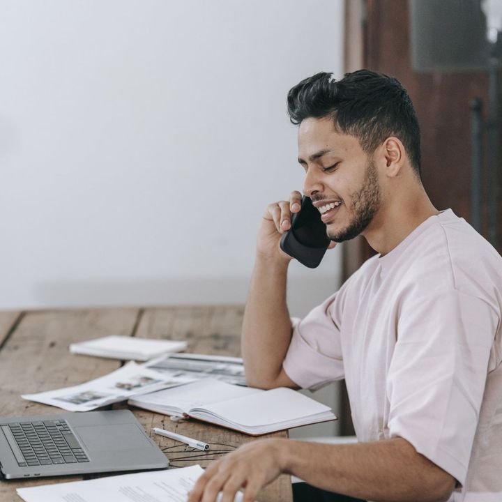 Photo of a happy resident calling