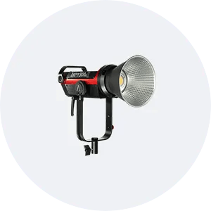 a red and black light is sitting on top of a white circle .