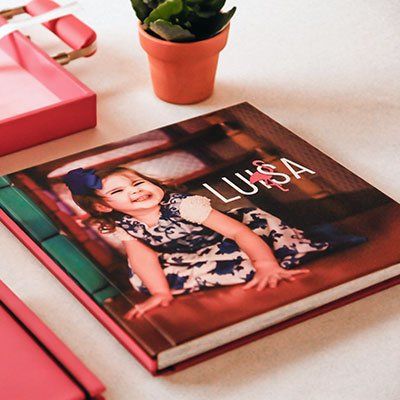 a photo book on a white desk