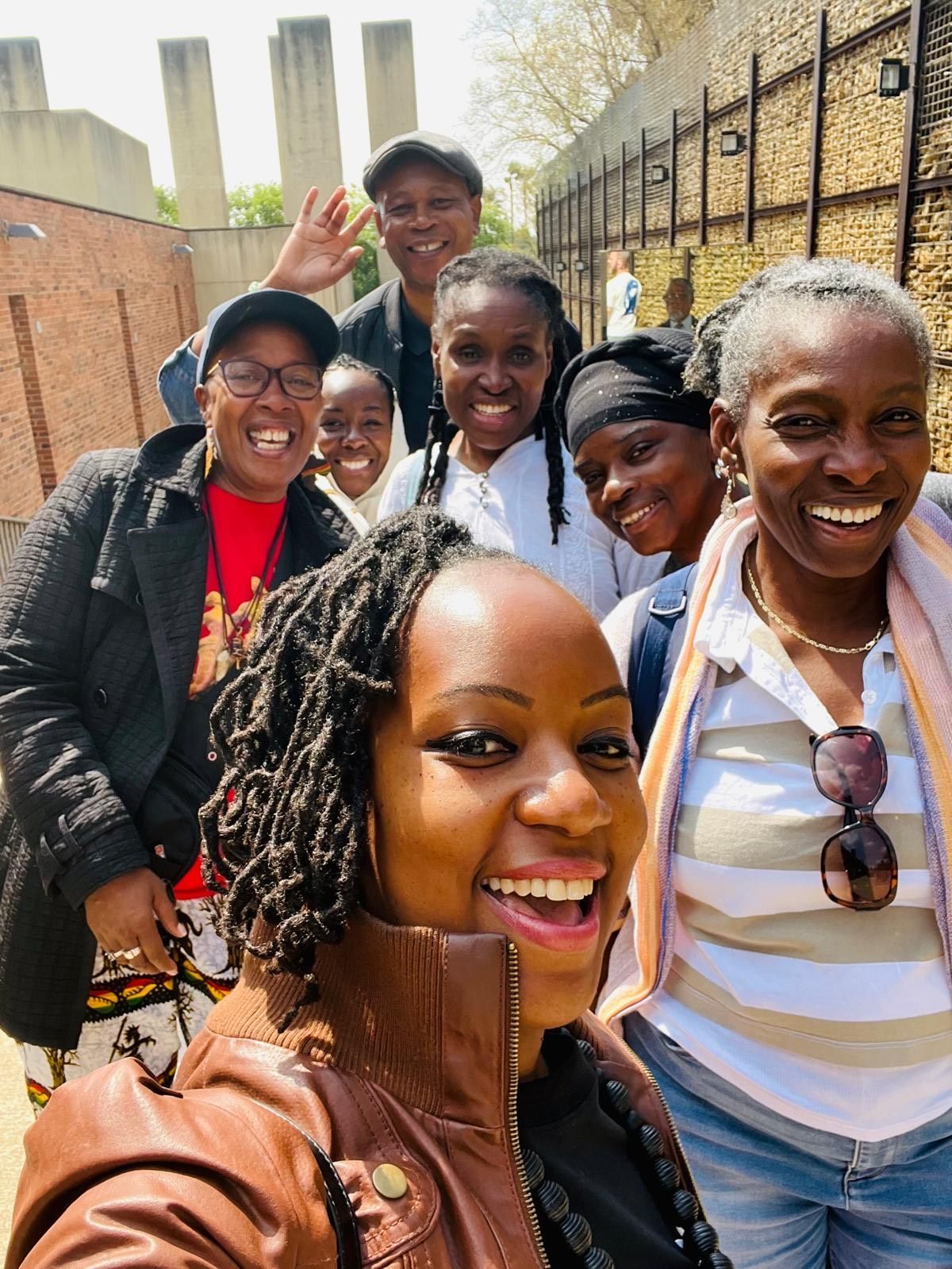 Flag of Ghana at a beach with sun loungers