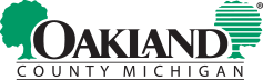 Oakland County Michigan logo with green tree graphics and black text