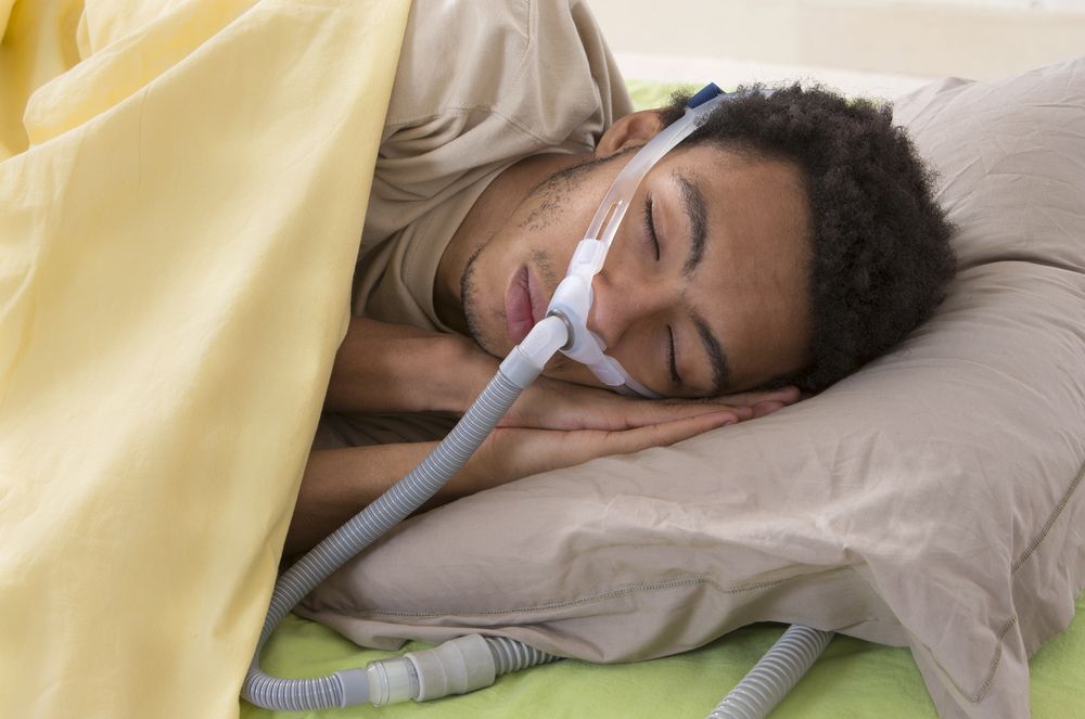 Person Sleeping on Their Side in Bed — Killara Dental in East Killara, NSW
