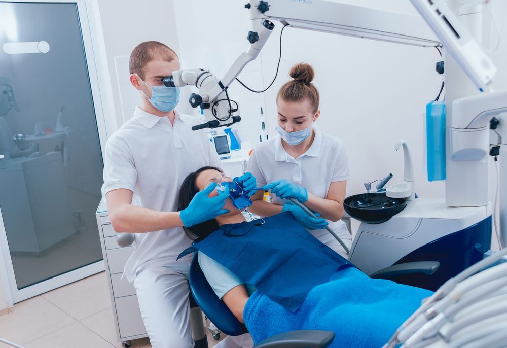 Dentist and Assistant Wearing Medical Masks — Killara Dental in East Killara, NSW
