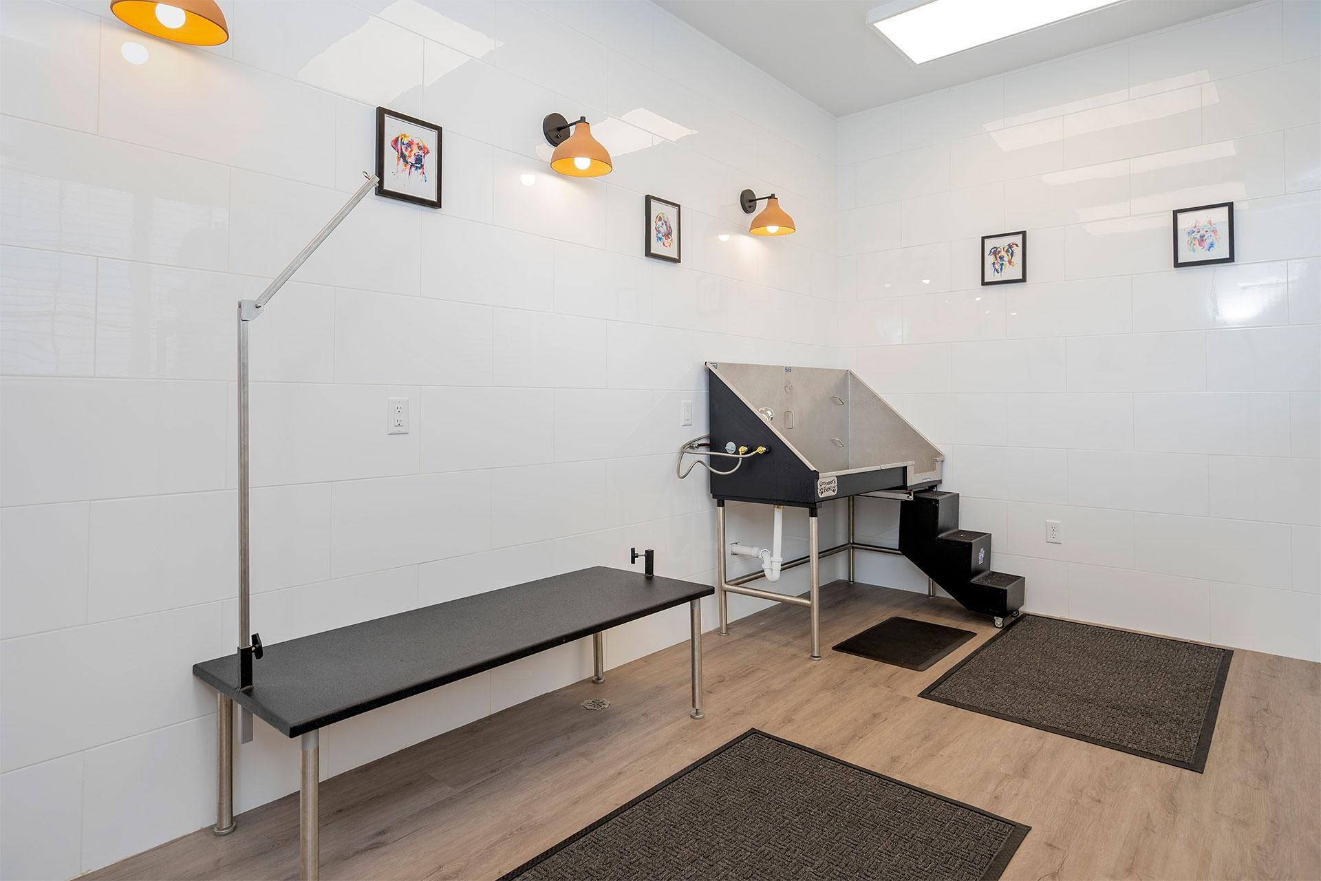 A room with a staircase and a table.
