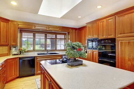 a kitchen with island counter