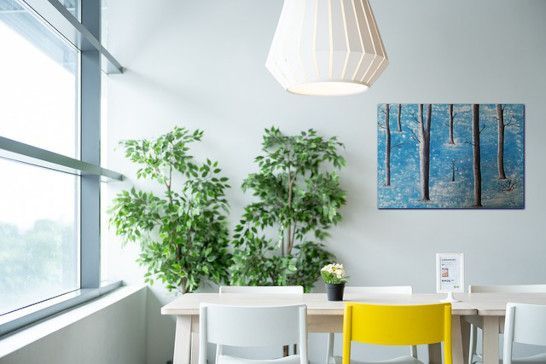 Unique space combining dining area and bathroom fixtures