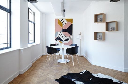 Elegant space with grand piano and dining area