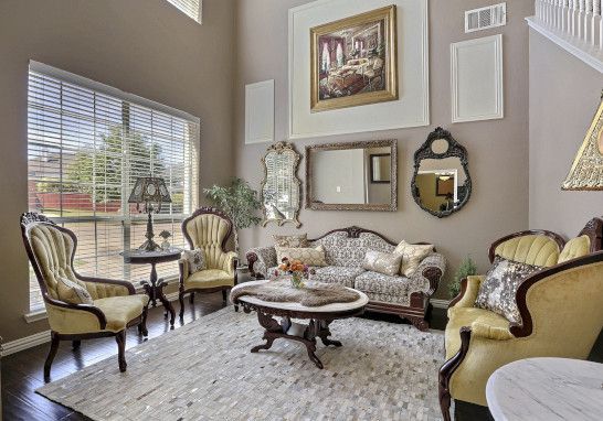 Elegant dining room with display storage and comfortable seating