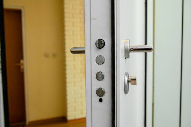 Close-up view of an interior door handle installed on a fire door.