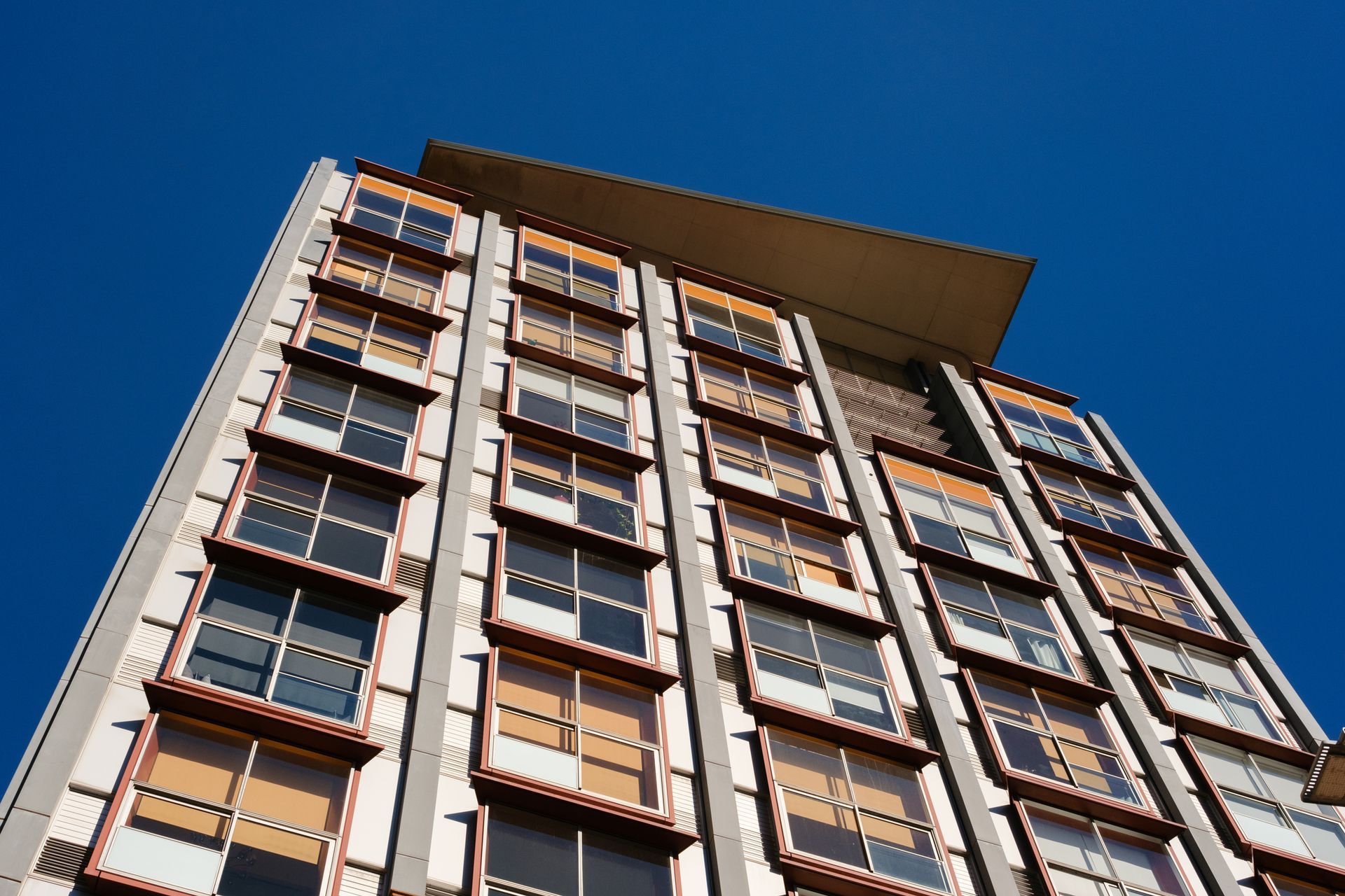 Tall modern apartment building.