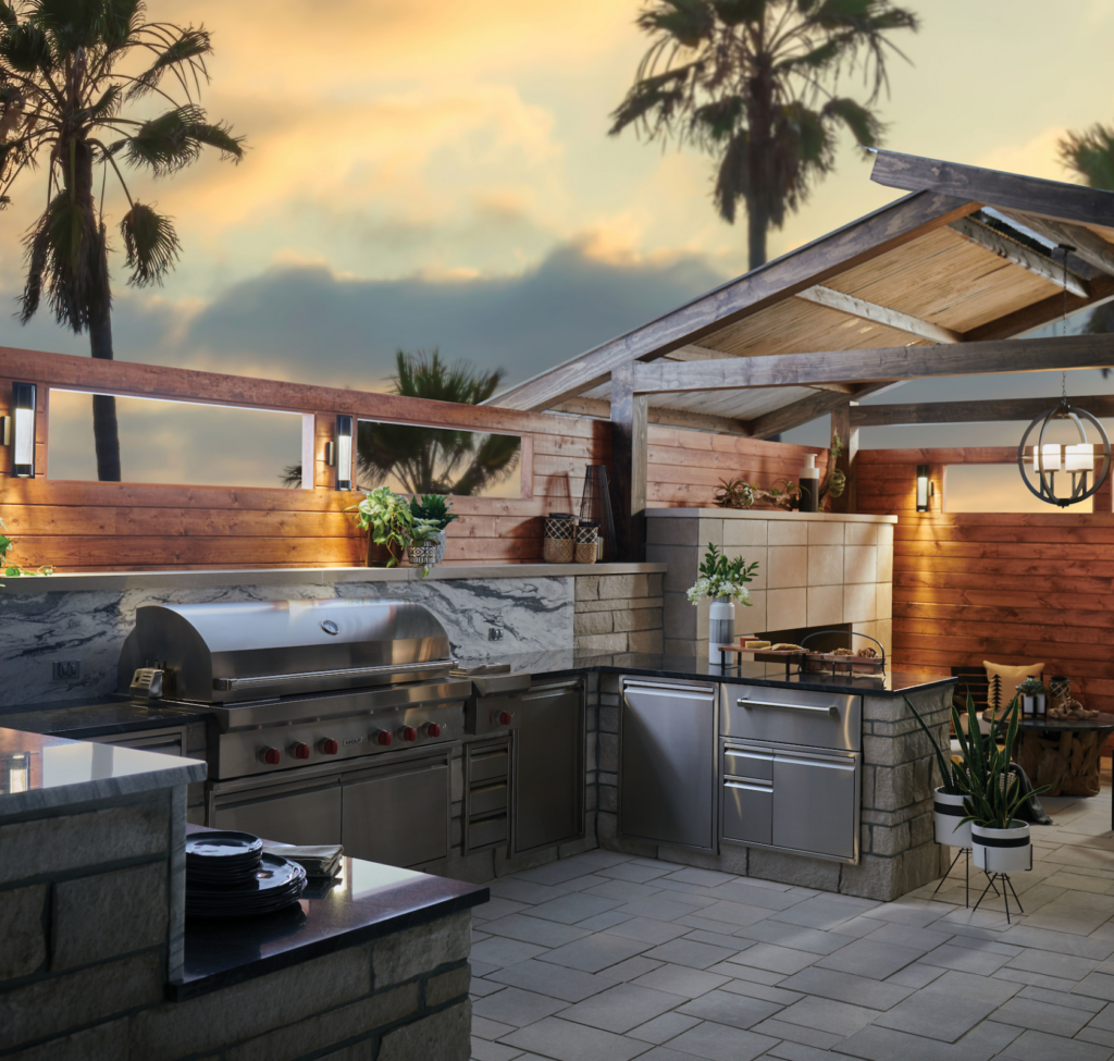 An outdoor kitchen with palm trees in the background