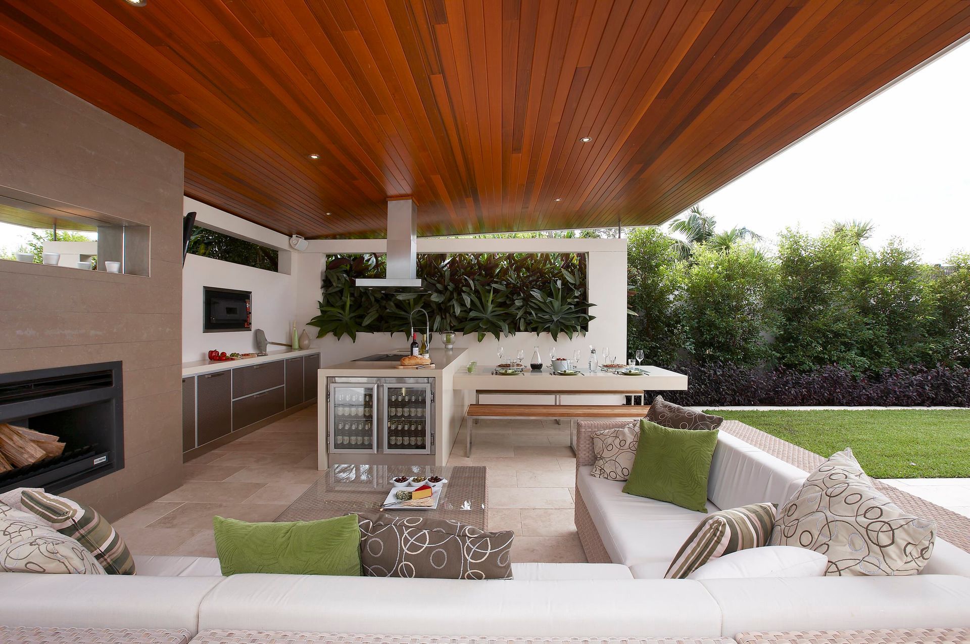 A living room with a wooden ceiling and a couch