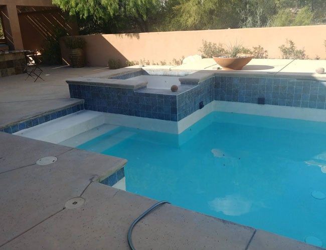 Home Swimming Pool Receiving Cleaning — Tucson, AZ — Nava Pool Plastering LLC