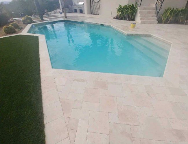Residential Swimming Pool with Stone Deck — Tucson, AZ — Nava Pool Plastering LLC