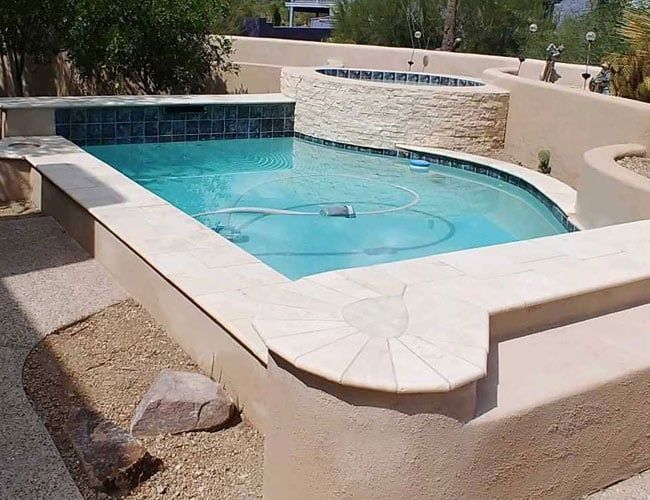 Swimming Pool with Spa Enhancements — Tucson, AZ — Nava Pool Plastering LLC