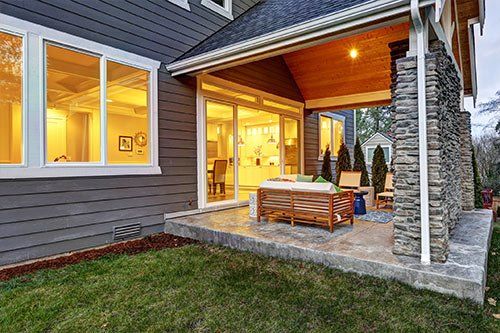 Back Patio With Sliding Windows