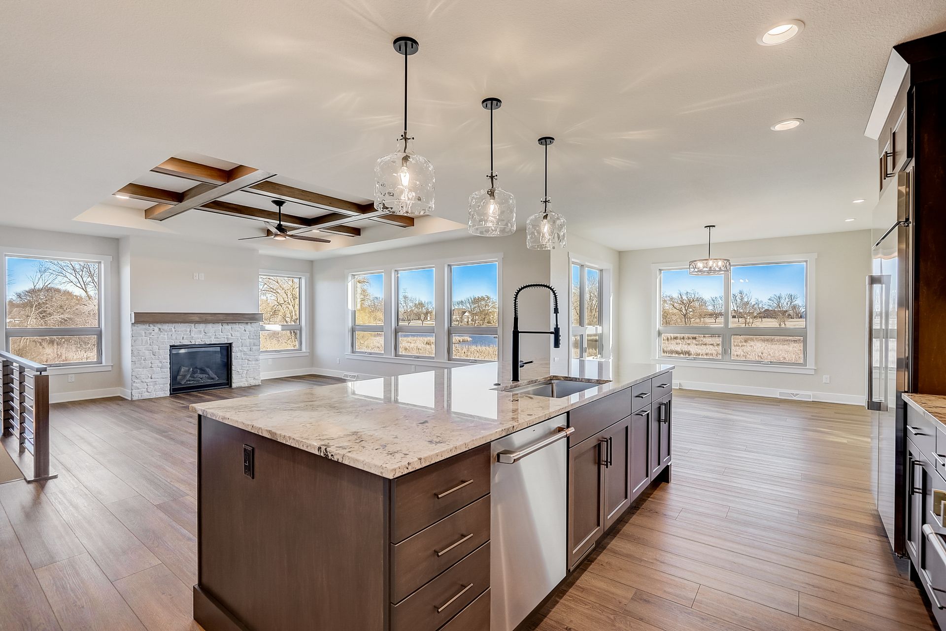 A living room with a fireplace and a flat screen tv