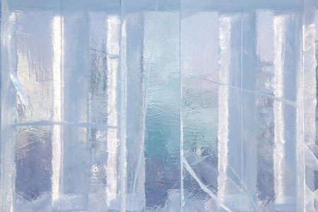 A close up of a piece of ice that looks like a window.