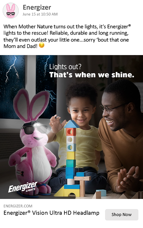 A man and a child are playing with a pink bunny headlamp.