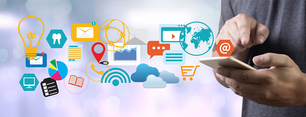 A man is using a smart phone with a bunch of icons coming out of it.