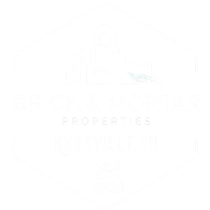 White logo for "Brick & Mortar Properties" within a hexagonal frame.