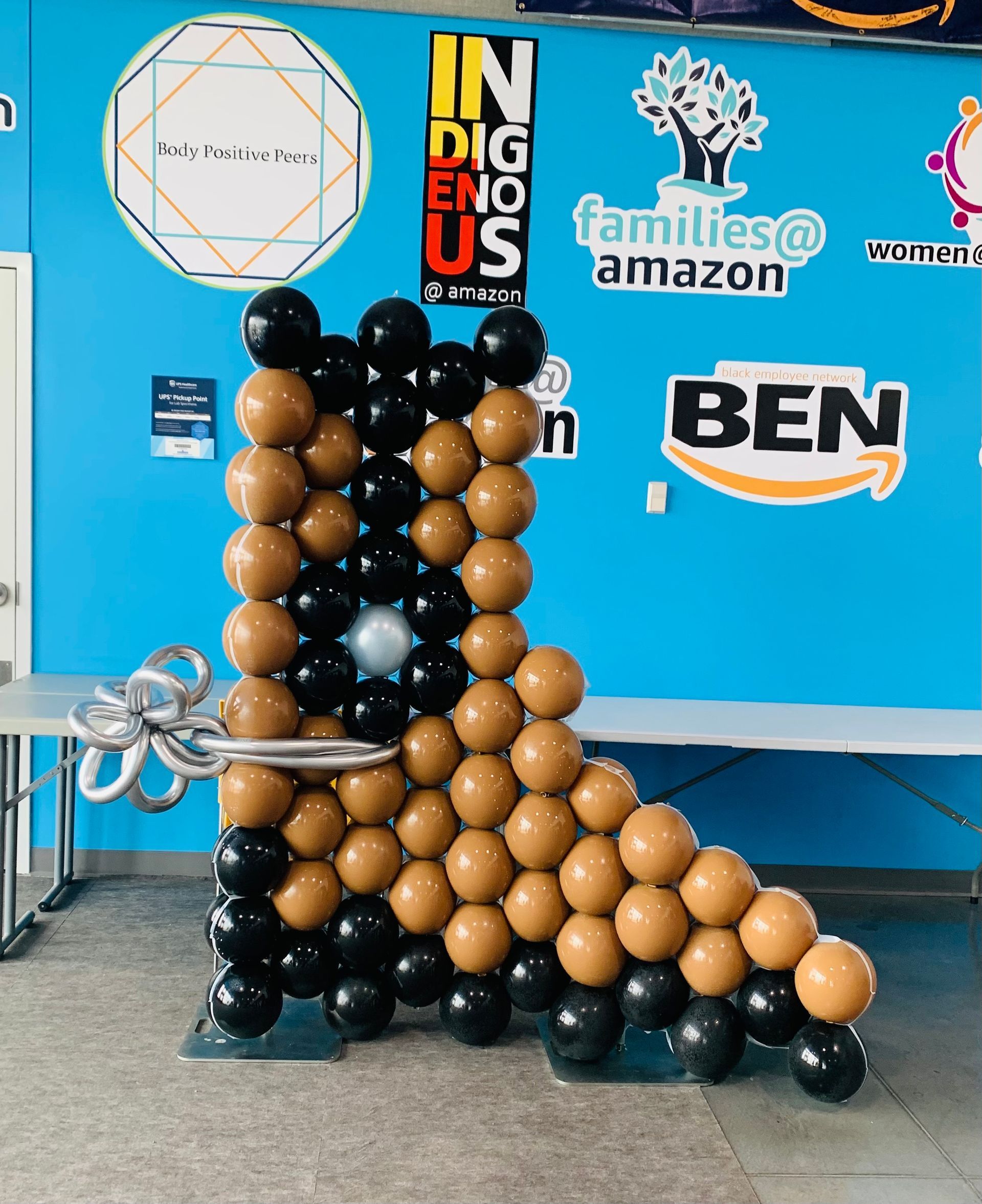 A bunch of balloons are stacked on top of each other