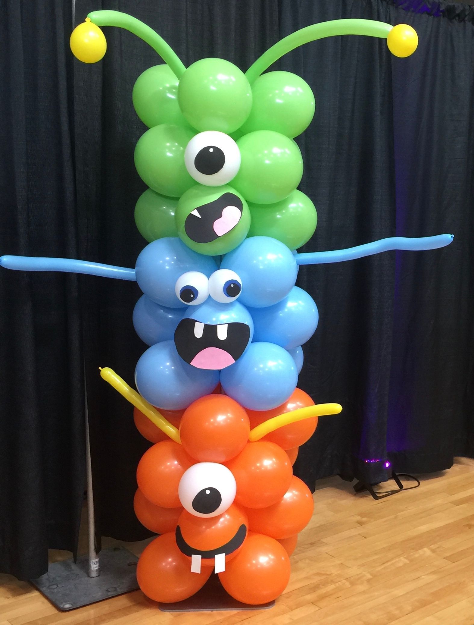 A bunch of balloons stacked on top of each other