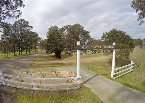 An Aerial View of a Cemetery With a Sign on the Side of the Road — Hutchinson Family Funerals In Taree, NSW
