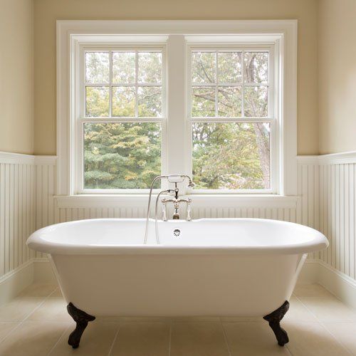 house with windows and black shutters