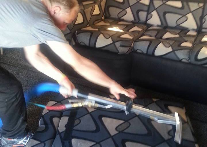 Man cleaning RV Cushion