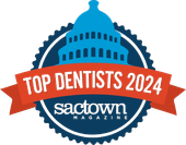 A badge that says top dentists 2024 on it
