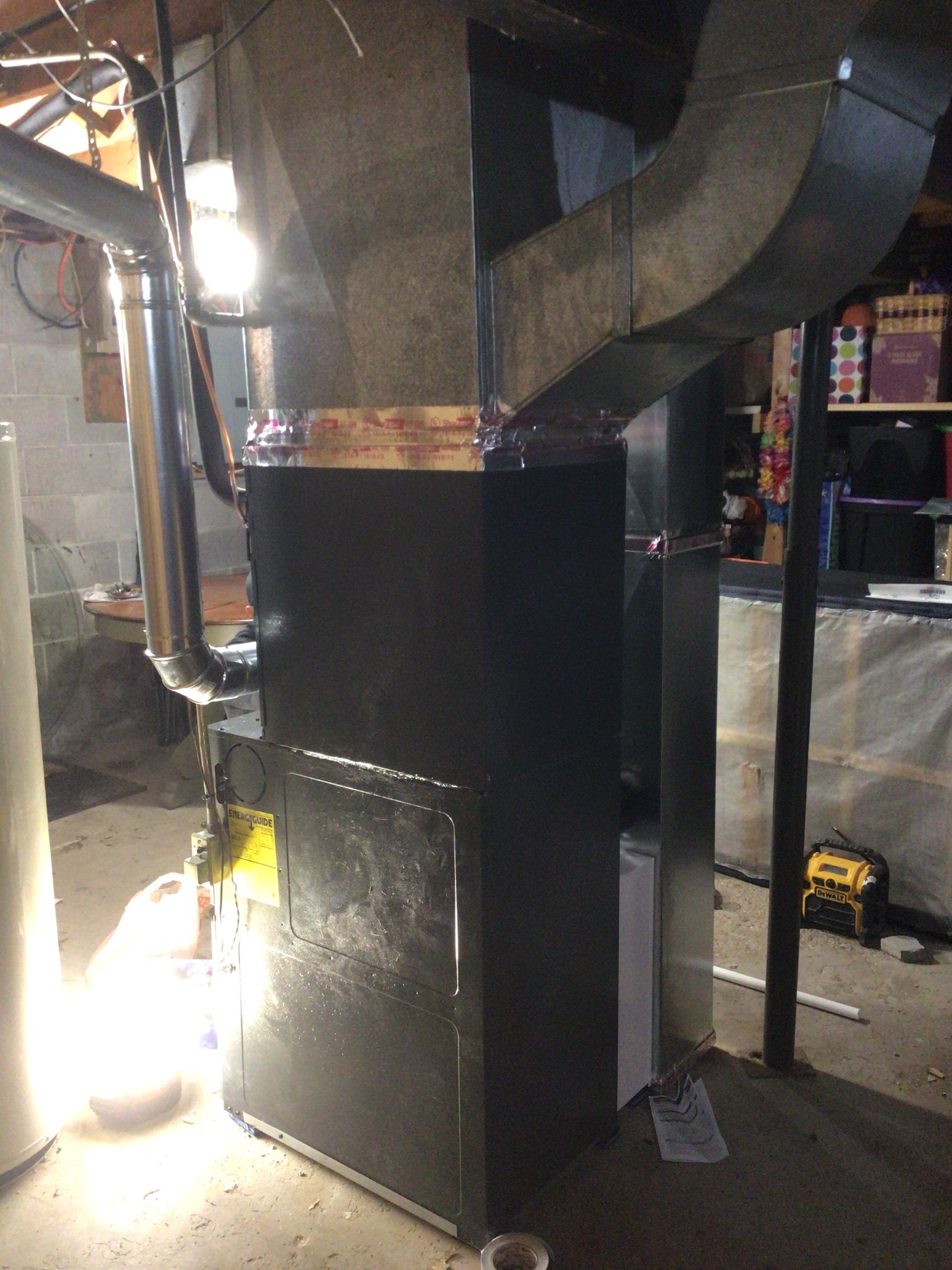 A large black box is sitting in a dark room