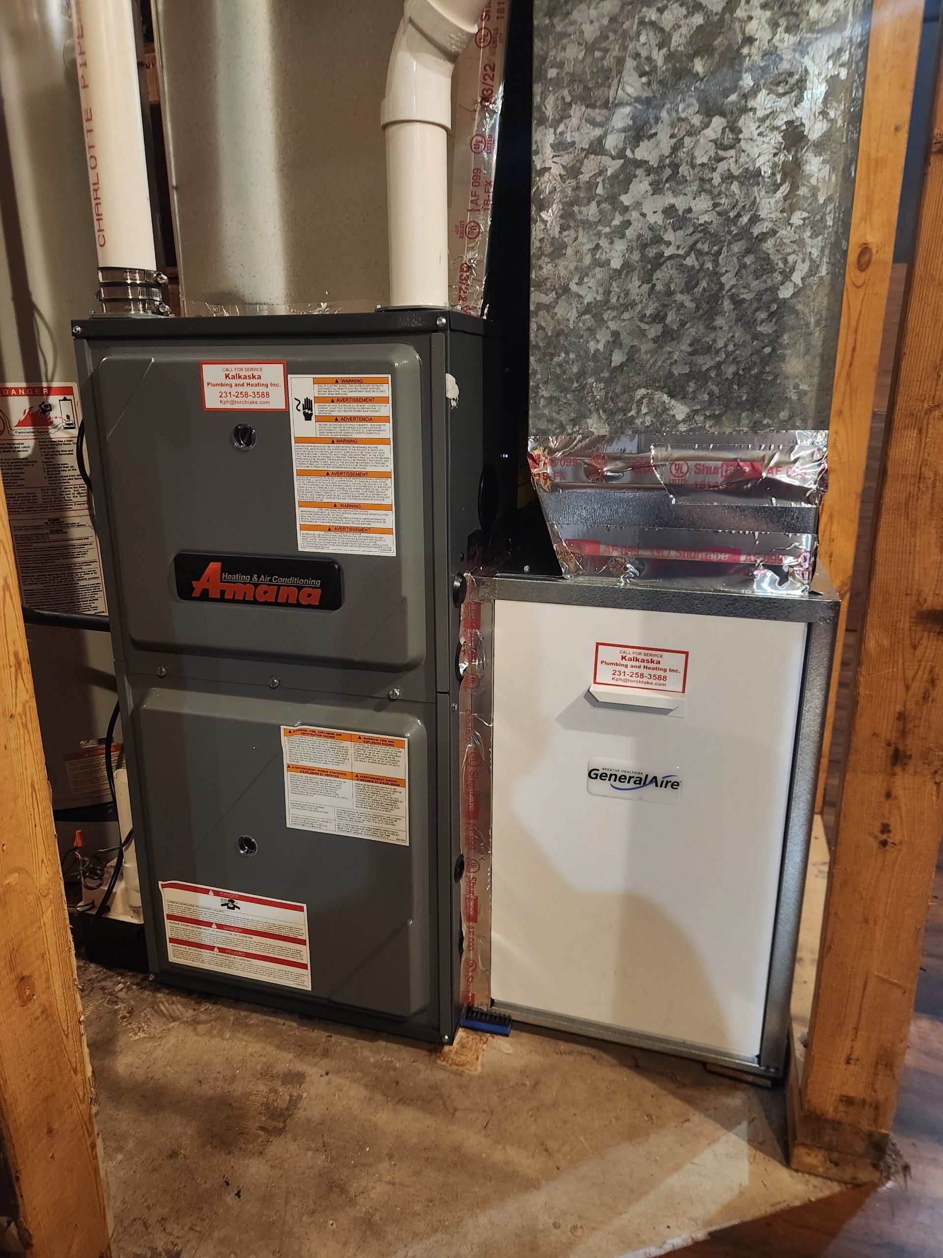 A heating and cooling system is installed in a basement.