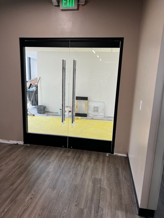 Black framed glass doors with a 