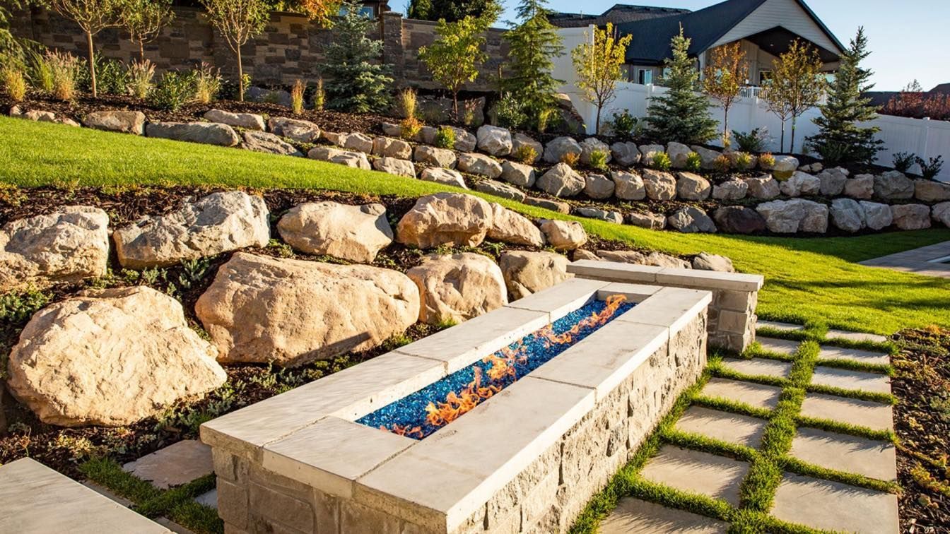 There is a fire pit in the middle of the yard.