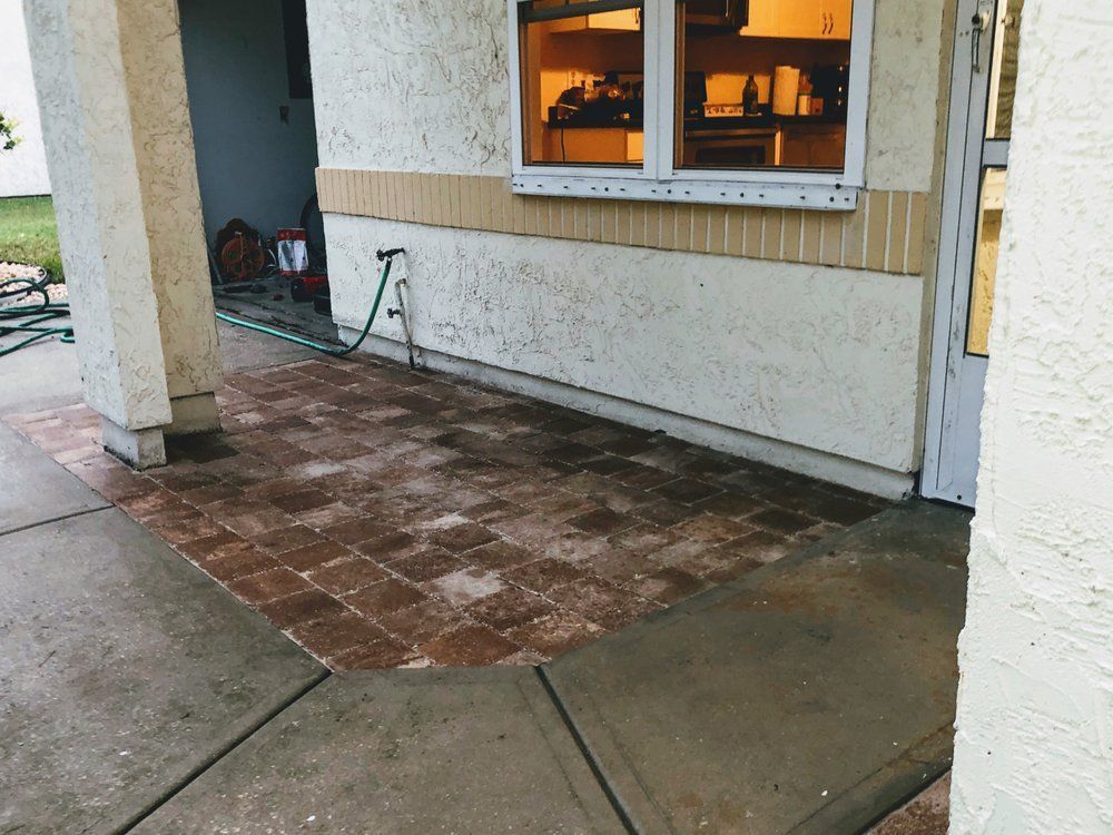 A hose is attached to the side of a building