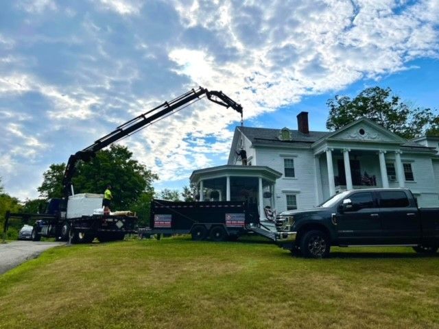 Worker Talking To Couple — Windsor, CT — HIG Roofing & Construction LLC