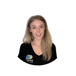 A woman with blonde curly hair is smiling and wearing a black shirt
